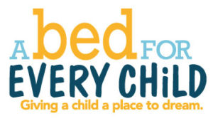 A Bed For Every Child logo with tagline "Giving a child a place to dream."